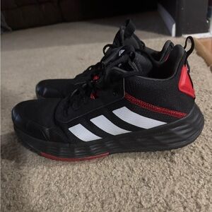 Adidas Black Sneakers with White Stripes and Red Details